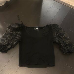 H&M divided black crop top 
Mesh arms